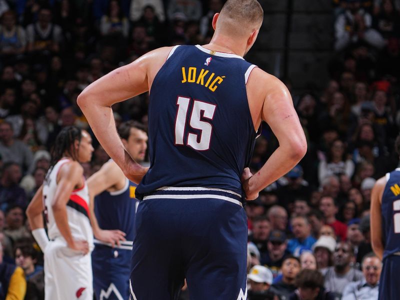 DENVER, CO - FEBRUARY 12:  Nikola Jokic #15 of the Denver Nuggets looks on during the game against the Portland Trail Blazers  on February 12, 2025 at Ball Arena in Denver, Colorado. NOTE TO USER: User expressly acknowledges and agrees that, by downloading and/or using this Photograph, user is consenting to the terms and conditions of the Getty Images License Agreement. Mandatory Copyright Notice: Copyright 2025 NBAE (Photo by Garrett Ellwood/NBAE via Getty Images)