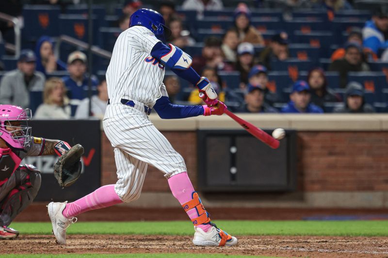 May 12, 2024; New York City, New York, USA; New York Mets left fielder Brandon Nimmo (9) hits a walk-off two run home run during the ninth inning against the Atlanta Braves at Citi Field. Mandatory Credit: Vincent Carchietta-USA TODAY Sports