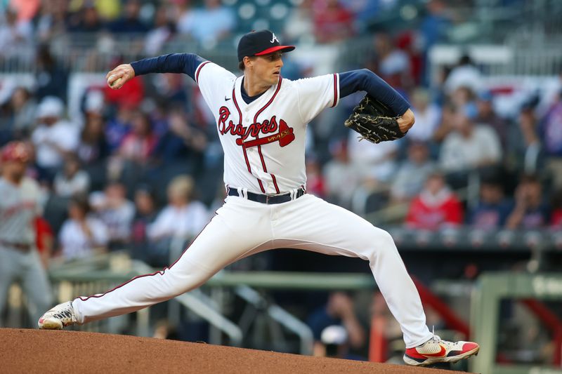 Apr 11, 2023; Atlanta, Georgia, USA; Atlanta Braves starting pitcher Kyle Wright (30) throws against the Cincinnati Reds in the first inning at Truist Park. Mandatory Credit: Brett Davis-USA TODAY Sports
