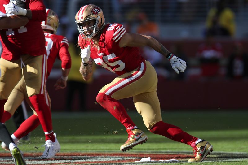 San Francisco 49ers tight end George Kittle (85) runs during an NFL football game against the Tampa Bay Buccaneers, Sunday, Nov. 19, 2023, in Santa Clara, Calif. (AP Photo/Scot Tucker)