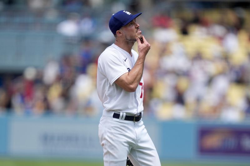 Jul 30, 2023; Los Angeles, California, USA; Los Angeles Dodgers starting pitcher Michael Grove (78) reacts after surrendering a home run to Cincinnati Reds designated hitter Joey Votto (hot pictured) in the third inning at Dodger Stadium. Mandatory Credit: Kirby Lee-USA TODAY Sports