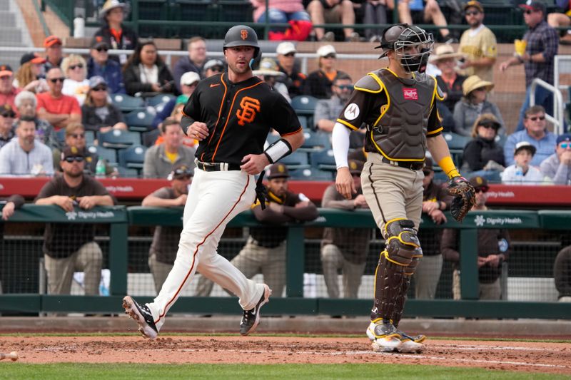 Feb 28, 2023; Scottsdale, Arizona, USA; San Francisco Giants catcher Joey Bart (21) scores a run against the San Diego Padres in the third inning at Scottsdale Stadium. Mandatory Credit: Rick Scuteri-USA TODAY Sports