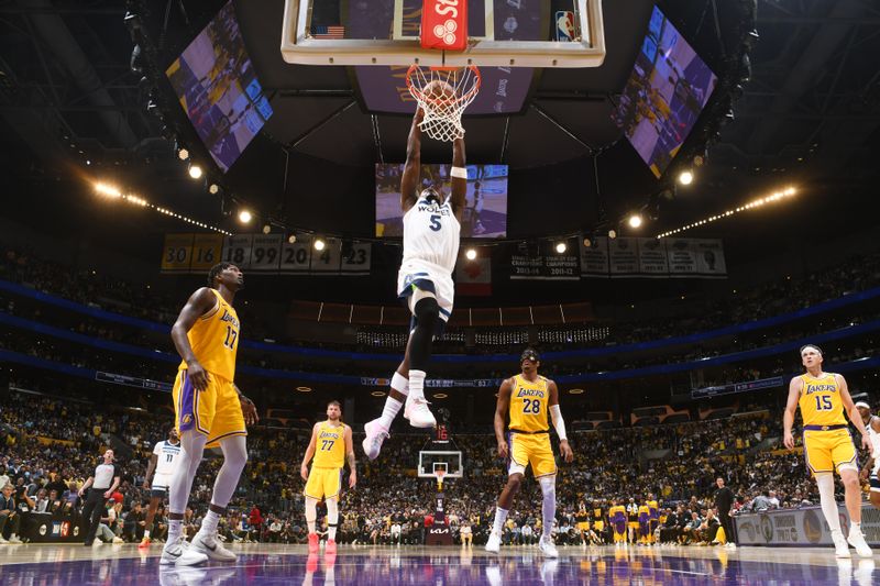 LOS ANGELES, CA - APRIL 22:  Anthony Edwards #5 of the Minnesota Timberwolves drives to the basket during the game against the Los Angeles Lakers during Round 1 Game 2 of the 2025 NBA Playoffs on April 22, 2025 at Crypto.Com Arena in Los Angeles, California. NOTE TO USER: User expressly acknowledges and agrees that, by downloading and/or using this Photograph, user is consenting to the terms and conditions of the Getty Images License Agreement. Mandatory Copyright Notice: Copyright 2025 NBAE (Photo by Adam Pantozzi/NBAE via Getty Images)