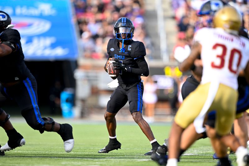 Nov 16, 2024; Dallas, Texas, USA; SMU Mustangs quarterback Kevin Jennings (7) drops back to pass against the Boston College Eagles during the first half at the Gerald J. Ford Stadium. Mandatory Credit: Jerome Miron-Imagn Images