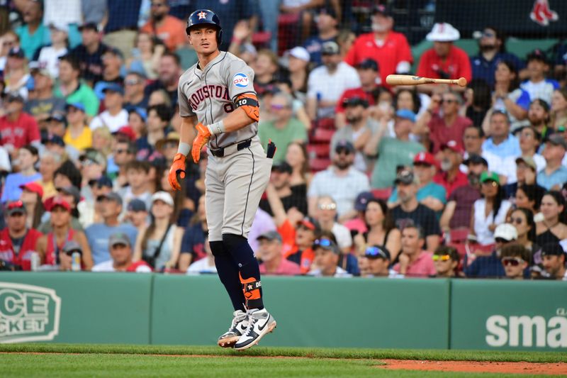 Aug 10, 2024; Boston, Massachusetts, USA;  Houston Astros first baseman Zach Dezenzo (9) flips his bat after hitting a home run during the eighth inning against the Boston Red Sox at Fenway Park. Mandatory Credit: Bob DeChiara-USA TODAY Sports