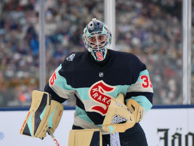 Jan 1, 2024; Seattle, Washington, USA; Seattle Kraken goaltender Joey Daccord (35) during the game in the 2024 Winter Classic ice hockey game against the Vegas Golden Knights at T-Mobile Park. Mandatory Credit: Steven Bisig-USA TODAY Sports
