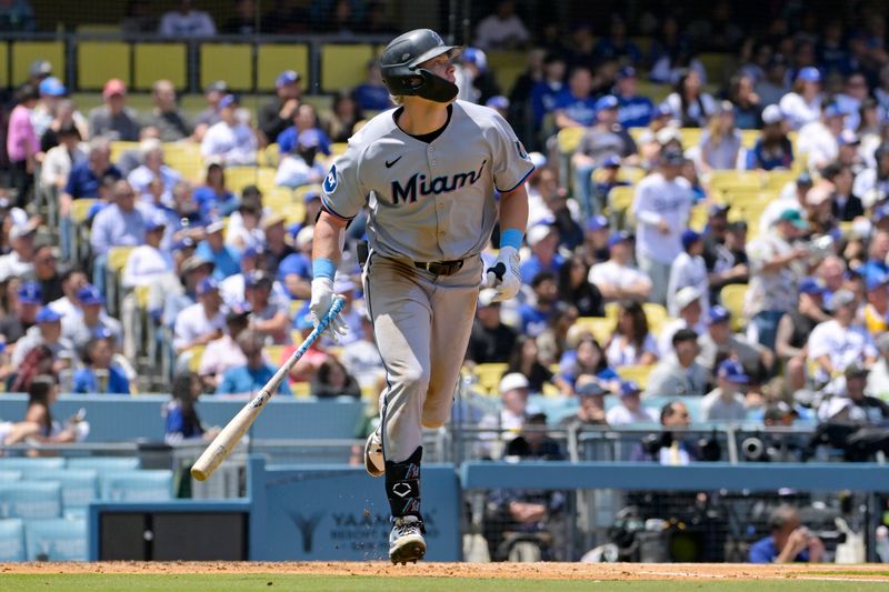 Apr 30, 2025; Los Angeles, California, USA; Miami Marlins right fielder Kyle Stowers (28) hits a two-run home run against the Los Angeles Dodgers during the fourth inning at Dodger Stadium. Mandatory Credit: Jayne Kamin-Oncea-Imagn Images