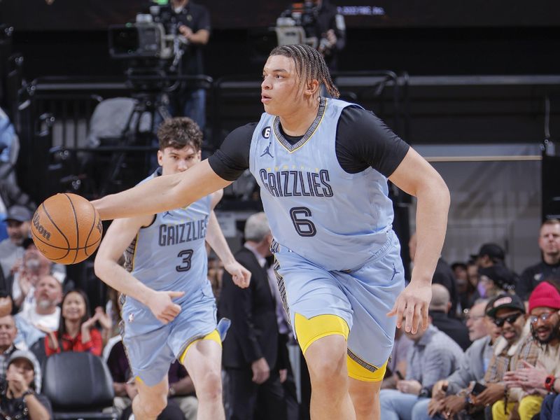 SACRAMENTO, CA - JANUARY 23:  Kenneth Lofton Jr. #6 of the Memphis Grizzlies drives to the basket during the game against the  Sacramento Kings on January 23, 2023 at Golden 1 Center in Sacramento, California. NOTE TO USER: User expressly acknowledges and agrees that, by downloading and or using this Photograph, user is consenting to the terms and conditions of the Getty Images License Agreement. Mandatory Copyright Notice: Copyright 2023 NBAE (Photo by Rocky Widner/NBAE via Getty Images)