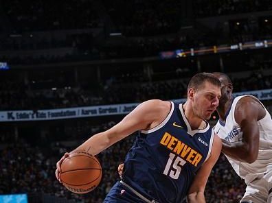 DENVER, CO - DECEMBER 28: Nikola Jokic #15 of the Denver Nuggets goes to the basket during the game on December 28, 2023 at the Ball Arena in Denver, Colorado. NOTE TO USER: User expressly acknowledges and agrees that, by downloading and/or using this Photograph, user is consenting to the terms and conditions of the Getty Images License Agreement. Mandatory Copyright Notice: Copyright 2023 NBAE (Photo by Bart Young/NBAE via Getty Images)