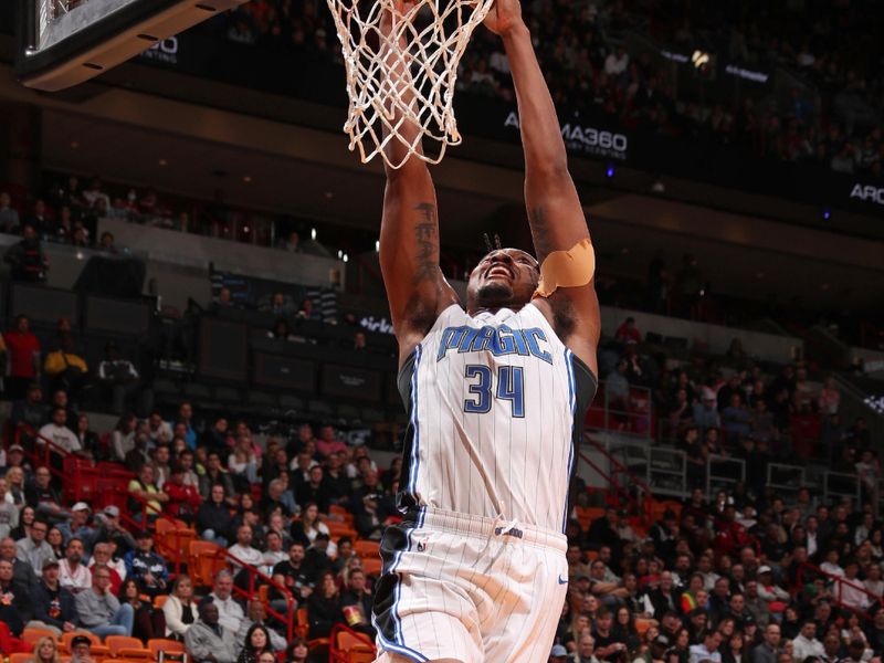 MIAMI, FL - FEBRUARY 6: Wendell Carter Jr. #34 of the Orlando Magic dunks the ball during the game against the Miami Heat on February 6, 2024 at Kaseya Center in Miami, Florida. NOTE TO USER: User expressly acknowledges and agrees that, by downloading and or using this Photograph, user is consenting to the terms and conditions of the Getty Images License Agreement. Mandatory Copyright Notice: Copyright 2024 NBAE (Photo by Issac Baldizon/NBAE via Getty Images)