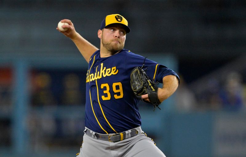 Aug 17, 2023; Los Angeles, California, USA;  Milwaukee Brewers starting pitcher Corbin Burnes (39) throws to the plate in the sixth inning against the Los Angeles Dodgers at Dodger Stadium. Mandatory Credit: Jayne Kamin-Oncea-USA TODAY Sports