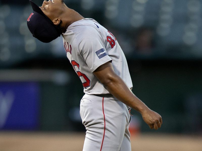 Apr 2, 2024; Oakland, California, USA; Boston Red Sox pitcher Brayan Bello (66) reacts to yielding a two-run home run to Oakland Athletics catcher Shea Langeliers during the second inning at Oakland-Alameda County Coliseum. Mandatory Credit: D. Ross Cameron-USA TODAY Sports