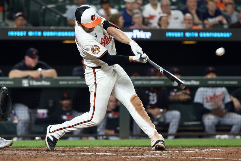 Jun 10, 2025; Baltimore, Maryland, USA; Baltimore Orioles third baseman Jordan Westburg (11) hits a home run during the ninth inning against the Detroit Tigers at Oriole Park at Camden Yards. Mandatory Credit: Daniel Kucin Jr.-Imagn Images