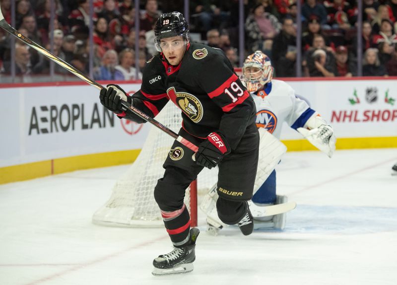 Nov 24, 2023; Ottawa, Ontario, CAN; Ottawa Senators right wing Drake Batherson (19) chases the puck in the first period against the New York Islanders at the Canadian Tire Centre. Mandatory Credit: Marc DesRosiers-USA TODAY Sports