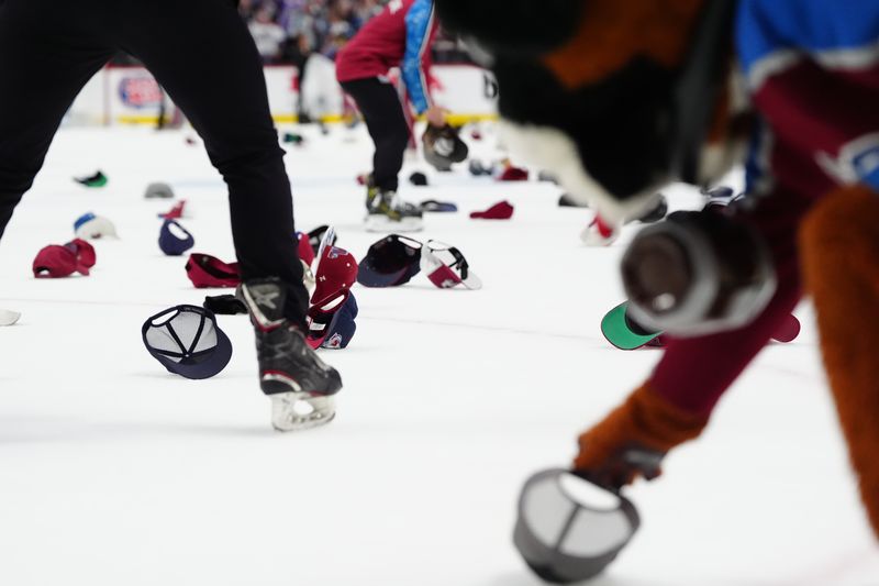 Apr 28, 2024; Denver, Colorado, USA; General view of hat on the rick following a following a hat trick goal by right wing Valeri Nichushkin (13) (not pictured) during the third period against the Winnipeg Jets in game four of the first round of the 2024 Stanley Cup Playoffs at Ball Arena. Mandatory Credit: Ron Chenoy-USA TODAY Sports