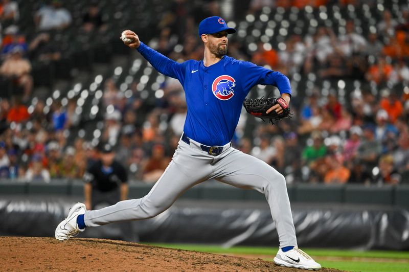 Jul 11, 2024; Baltimore, Maryland, USA; Chicago Cubs pitcher Jorge López (41) throws  a ninth inning pitch against the Baltimore Orioles at Oriole Park at Camden Yards. Mandatory Credit: Tommy Gilligan-USA TODAY Sports