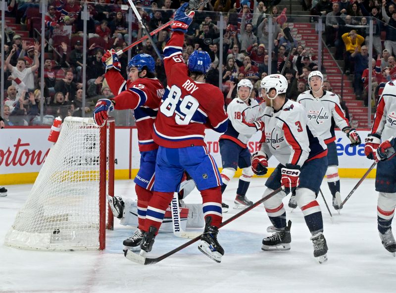 Feb 17, 2024; Montreal, Quebec, CAN; Montreal Canadiens forward Alex Newhook (15) celebrates with teammate forward Joshua Roy (89) after scoring a goal against the Washington Capitals during the second period at the Bell Centre. Mandatory Credit: Eric Bolte-USA TODAY Sports