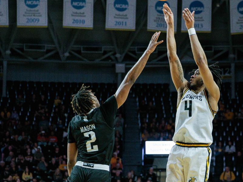 Mar 2, 2024; Wichita, Kansas, USA; Wichita State Shockers guard Colby Rogers (4) shoots the ball over Rice Owls guard Mekhi Mason (2) during the first half at Charles Koch Arena. Mandatory Credit: William Purnell-USA TODAY Sports