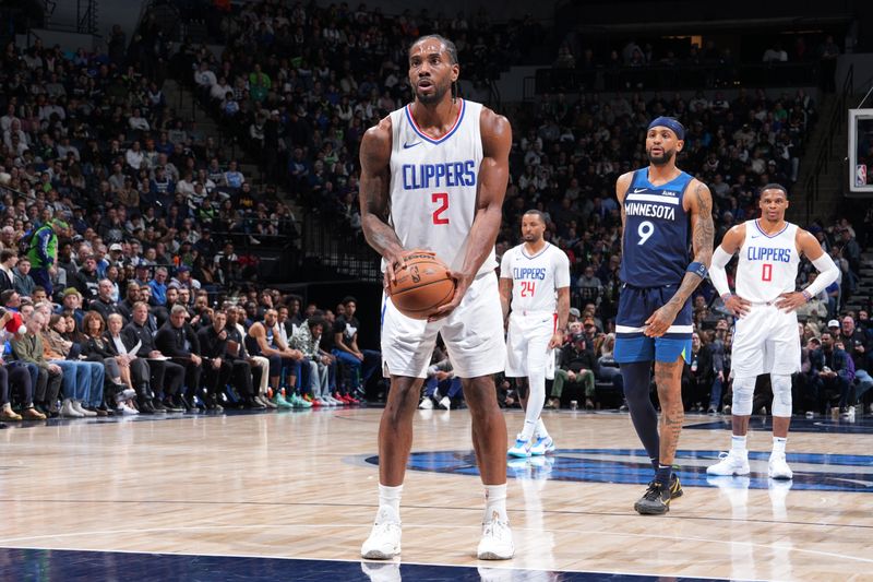 MINNEAPOLIS, MN -  JANUARY 14: Kawhi Leonard #2 of the LA Clippers shoots a free throw during the game against the Minnesota Timberwolves on January 14, 2024 at Target Center in Minneapolis, Minnesota. NOTE TO USER: User expressly acknowledges and agrees that, by downloading and or using this Photograph, user is consenting to the terms and conditions of the Getty Images License Agreement. Mandatory Copyright Notice: Copyright 2024 NBAE (Photo by Jordan Johnson/NBAE via Getty Images)