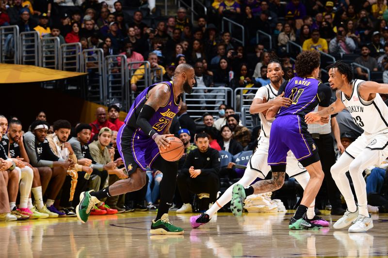 LOS ANGELES, CA - JANUARY 17: LeBron James #23 of the Los Angeles Lakers dribbles the ball during the game against the Brooklyn Nets on January 17, 2025 at Crypto.Com Arena in Los Angeles, California. NOTE TO USER: User expressly acknowledges and agrees that, by downloading and/or using this Photograph, user is consenting to the terms and conditions of the Getty Images License Agreement. Mandatory Copyright Notice: Copyright 2025 NBAE (Photo by Adam Pantozzi/NBAE via Getty Images)