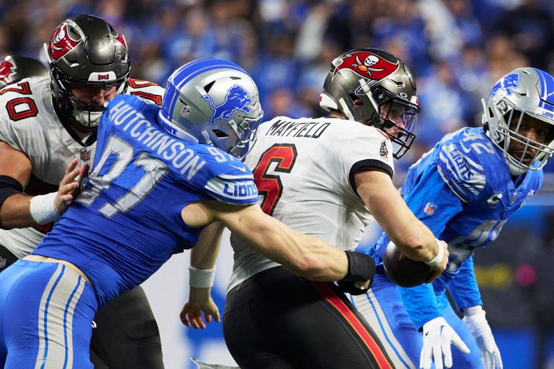 Detroit Lions defensive end Aidan Hutchinson (97) pressures Tampa Bay Buccaneers quarterback Baker Mayfield (6) during an NFL divisional round playoff football game, Sunday, Jan. 21, 2024, in Detroit. (AP Photo/Rick Osentoski)