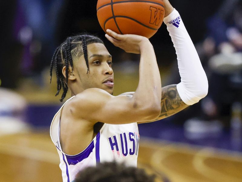 Feb 18, 2023; Seattle, Washington, USA; Oregon State Beavers guard Jordan Pope (0) shoots against the Oregon State Beavers during the second half at Alaska Airlines Arena at Hec Edmundson Pavilion. Mandatory Credit: Joe Nicholson-USA TODAY Sports