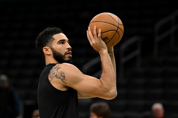 BOSTON, MASSACHUSETTS - DECEMBER 28: Jayson Tatum #0 of the Boston Celtics takes a shot during warmups before a game against the Detroit Pistons at the TD Garden on December 28, 2023 in Boston, Massachusetts. NOTE TO USER: User expressly acknowledges and agrees that, by downloading and or using this photograph, User is consenting to the terms and conditions of the Getty Images License Agreement. (Photo by Brian Fluharty/Getty Images)