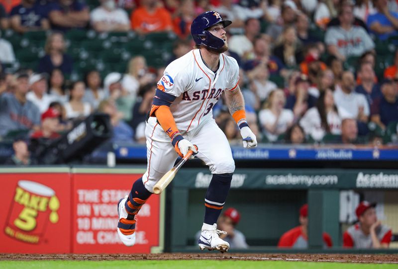 Jun 5, 2024; Houston, Texas, USA; Houston Astros right fielder Trey Cabbage (38) hits a home run during the fifth inning against the St. Louis Cardinals at Minute Maid Park. Mandatory Credit: Troy Taormina-USA TODAY Sports