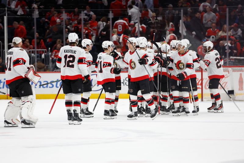 Apr 7, 2024; Washington, District of Columbia, USA; Ottawa Senators goaltender Joonas Korpisalo (70) celebrates with teammates after their game against the Washington Capitals at Capital One Arena. Mandatory Credit: Geoff Burke-USA TODAY Sports