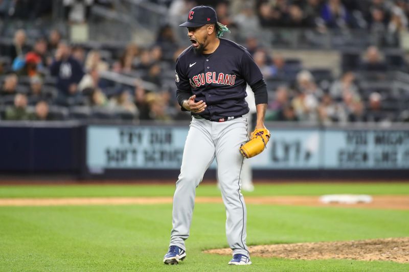 May 1, 2023; Bronx, New York, USA;  Cleveland Guardians relief pitcher Emmanuel Clase (48) celebrates after recording a save to defeat the New York Yankees 3-2 at Yankee Stadium. Mandatory Credit: Wendell Cruz-USA TODAY Sports