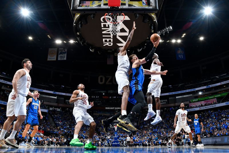 ORLANDO, FL - APRIL 27: Moritz Wagner #21 of the Orlando Magic drives to the basket during the game against the Cleveland Cavaliers during Round 1 Game 4 of the 2024 NBA Playoffs on April 27, 2024 at the Kia Center in Orlando, Florida. NOTE TO USER: User expressly acknowledges and agrees that, by downloading and or using this photograph, User is consenting to the terms and conditions of the Getty Images License Agreement. Mandatory Copyright Notice: Copyright 2024 NBAE (Photo by Fernando Medina/NBAE via Getty Images)