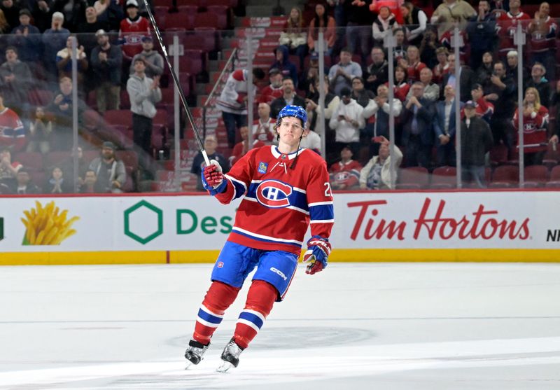 Apr 9, 2024; Montreal, Quebec, CAN; Montreal Canadiens forward Christian Dvorak (28) reacts after the game against the Philadelphia Flyers at the Bell Centre. Mandatory Credit: Eric Bolte-USA TODAY Sports