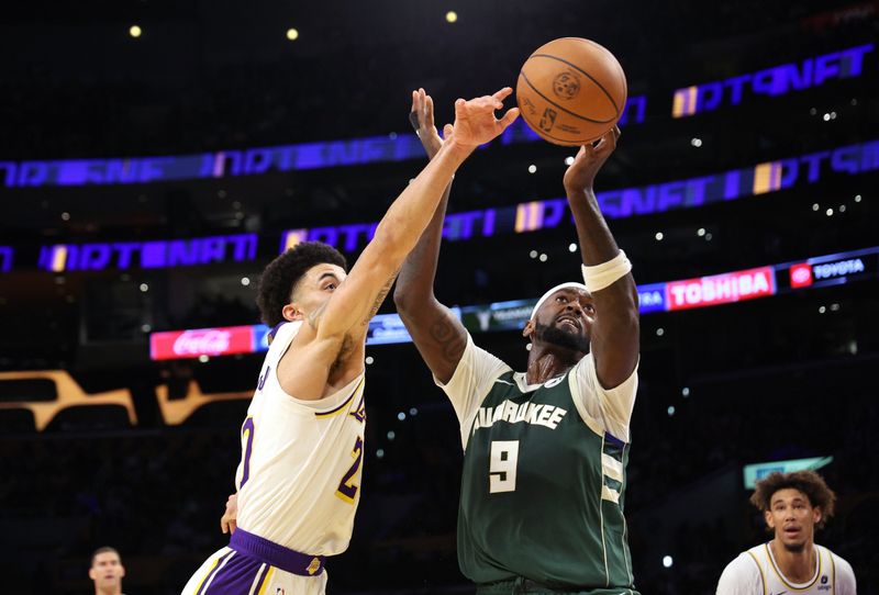 LOS ANGELES, CALIFORNIA - OCTOBER 15: Scotty Pippen Jr. #20 of the Los Angeles Lakers knocks the ball away from Bobby Portis #9 of the Milwaukee Bucks during the second half of a preseason basketball game at Crypto.com Arena on October 15, 2023 in Los Angeles, California. NOTE TO USER: User expressly acknowledges and agrees that, by downloading and or using this photograph, User is consenting to the terms and conditions of the Getty Images License Agreement. (Photo by Kevork Djansezian/Getty Images)