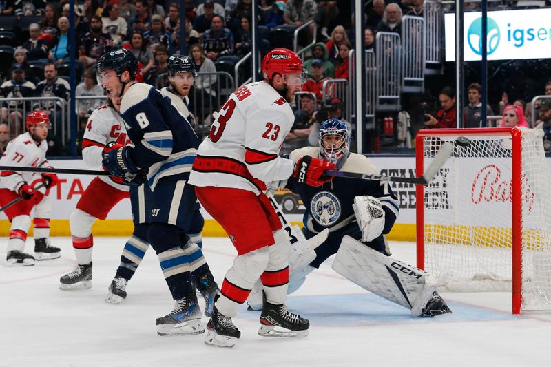 Apr 16, 2024; Columbus, Ohio, USA; Carolina Hurricanes right wing Stefan Noesen (23) tips the puck wide of Columbus Blue Jackets goalie Jet Greaves (73) during the third period at Nationwide Arena. Mandatory Credit: Russell LaBounty-USA TODAY Sports