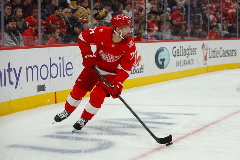 Jan 3, 2026; Detroit, Michigan, USA; Detroit Red Wings center Dylan Larkin (71) handles the puck during the first period against the Pittsburgh Penguins at Little Caesars Arena. Mandatory Credit: Brian Bradshaw Sevald-Imagn Images