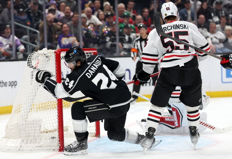 Mar 19, 2024; Los Angeles, California, USA;  Los Angeles Kings center Phillip Danault (24) reacts after scoring a goal during the third period against the Chicago Blackhawks at Crypto.com Arena. Mandatory Credit: Kiyoshi Mio-USA TODAY Sports