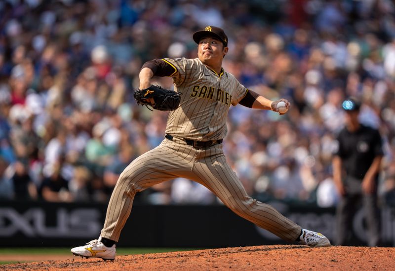 Aug 27, 2025; Seattle, Washington, USA; San Diego Padres reliever Yuki Matsui (1) delivers a pitch during the eighth inning against the Seattle Mariners at T-Mobile Park. Mandatory Credit: Stephen Brashear-Imagn Images