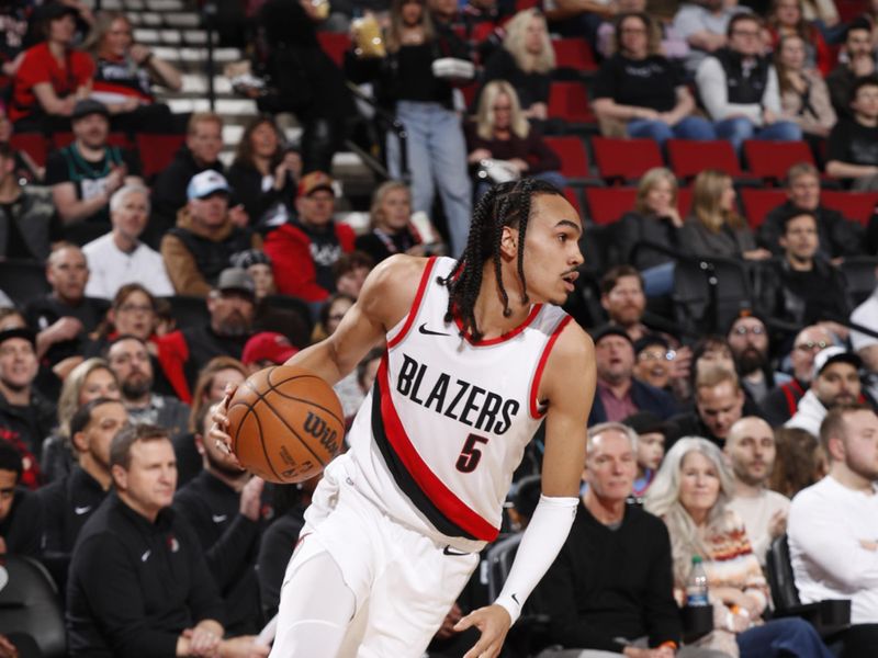 PORTLAND, OR - MARCH 8:  Dalano Banton #5 of the Portland Trail Blazers handles the ball during the game  on March 8, 2024 at the Moda Center Arena in Portland, Oregon. NOTE TO USER: User expressly acknowledges and agrees that, by downloading and or using this photograph, user is consenting to the terms and conditions of the Getty Images License Agreement. Mandatory Copyright Notice: Copyright 2024 NBAE (Photo by Cameron Browne/NBAE via Getty Images)