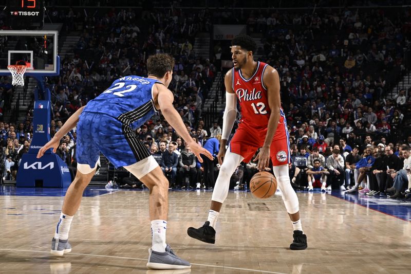 PHILADELPHIA, PA - APRIL 12: Tobias Harris #12 of the Philadelphia 76ers dribbles the ball during the game against the Orlando Magic on April 12, 2024 at the Wells Fargo Center in Philadelphia, Pennsylvania NOTE TO USER: User expressly acknowledges and agrees that, by downloading and/or using this Photograph, user is consenting to the terms and conditions of the Getty Images License Agreement. Mandatory Copyright Notice: Copyright 2024 NBAE (Photo by David Dow/NBAE via Getty Images)