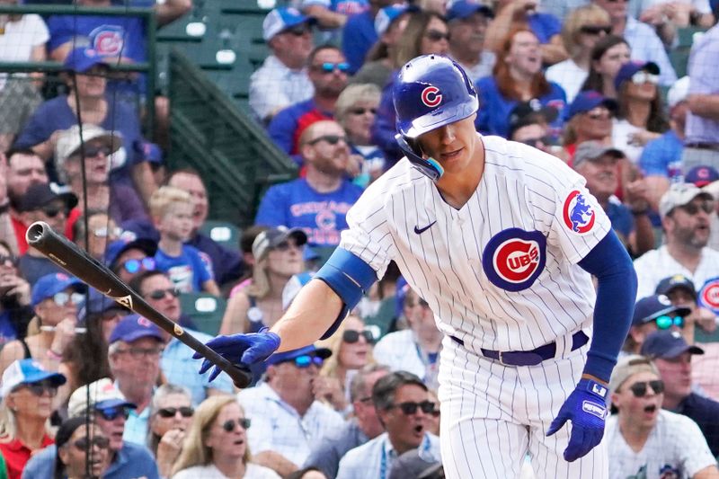 Sep 22, 2023; Chicago, Illinois, USA; Chicago Cubs designated hitter Jared Young (18) hits a two-run home run against the Colorado Rockies during the sixth inning at Wrigley Field. Mandatory Credit: David Banks-USA TODAY Sports