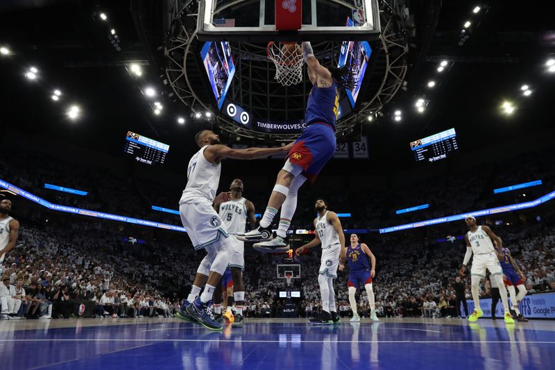 MINNEAPOLIS, MN -  MAY 16: Aaron Gordon #50 of the Denver Nuggets dunks the ball during the game against the Minnesota Timberwolves during Round 2 Game 6 of the 2024 NBA Playoffs on May 16, 2024 at Target Center in Minneapolis, Minnesota. NOTE TO USER: User expressly acknowledges and agrees that, by downloading and or using this Photograph, user is consenting to the terms and conditions of the Getty Images License Agreement. Mandatory Copyright Notice: Copyright 2024 NBAE (Photo by Jordan Johnson/NBAE via Getty Images)