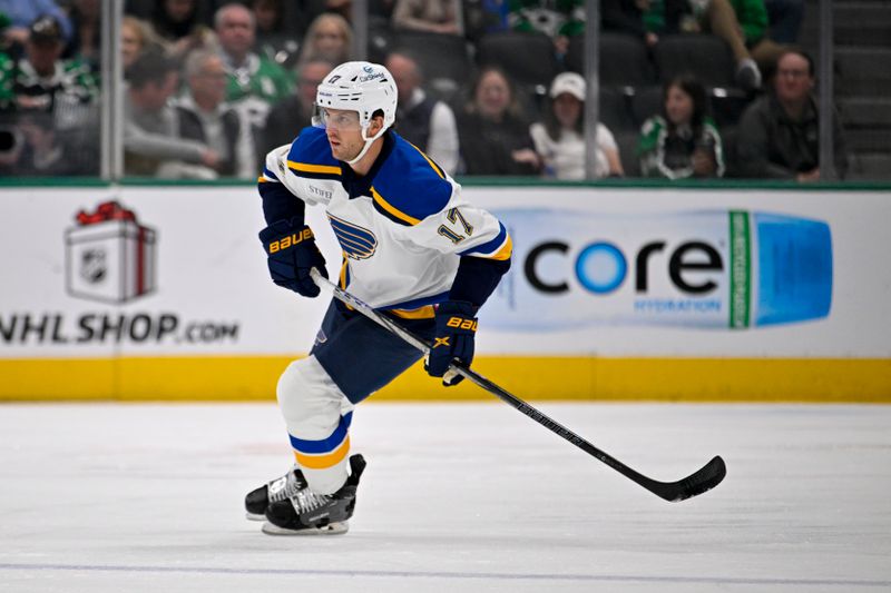 Dec 14, 2024; Dallas, Texas, USA; St. Louis Blues defenseman Cam Fowler (17) skates against the Dallas Stars during the first period at American Airlines Center. Mandatory Credit: Jerome Miron-Imagn Images