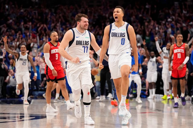 DALLAS, TEXAS - APRIL 07: Dante Exum #0 of the Dallas Mavericks celebrates with Luka Doncic #77 after making a buzzer beater 3-pt basket to tie the game in the fourth quarter and force overtime against the Houston Rockets at American Airlines Center on April 07, 2024 in Dallas, Texas. NOTE TO USER: User expressly acknowledges and agrees that, by downloading and or using this photograph, User is consenting to the terms and conditions of the Getty Images License Agreement. (Photo by Sam Hodde/Getty Images)