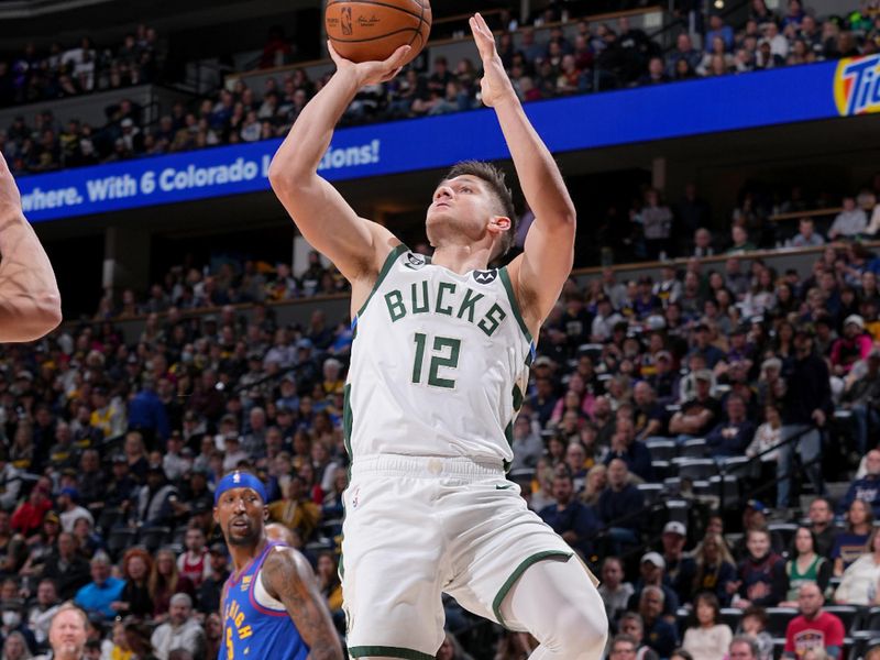 DENVER, CO - MARCH 25: Grayson Allen #12 of the Milwaukee Bucks shoots the ball during the game against the Denver Nuggets on March 25, 2023 at the Ball Arena in Denver, Colorado. NOTE TO USER: User expressly acknowledges and agrees that, by downloading and/or using this Photograph, user is consenting to the terms and conditions of the Getty Images License Agreement. Mandatory Copyright Notice: Copyright 2023 NBAE (Photo by Bart Young/NBAE via Getty Images)