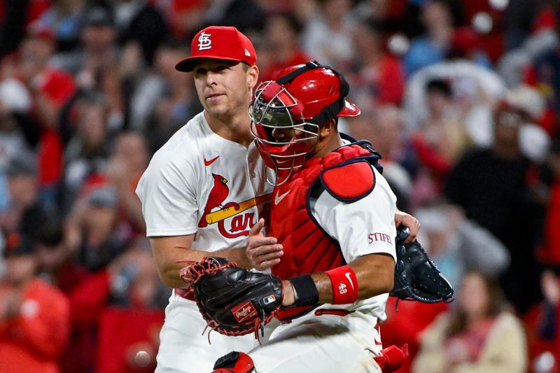 Apr 9, 2024; St. Louis, Missouri, USA;  St. Louis Cardinals relief pitcher Ryan Helsley (56) celebrates with catcher Ivan Herrera (48) after the Cardinals defeated the Philadelphia Phillies at Busch Stadium. Mandatory Credit: Jeff Curry-USA TODAY Sports