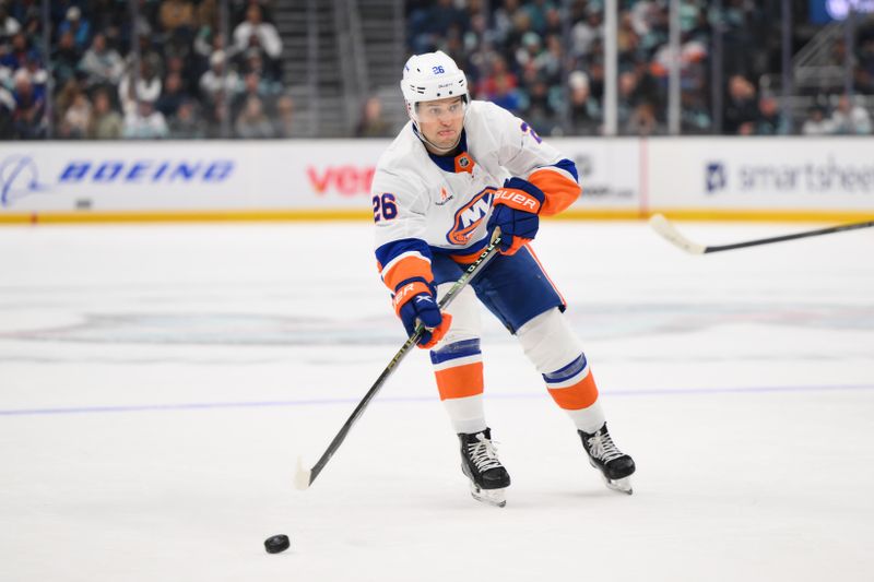 Nov 16, 2024; Seattle, Washington, USA; New York Islanders right wing Oliver Wahlstrom (26) plays the puck during the second period against the Seattle Kraken at Climate Pledge Arena. Mandatory Credit: Steven Bisig-Imagn Images