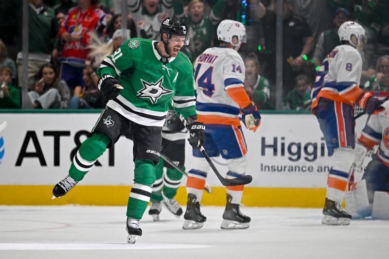 Oct 12, 2024; Dallas, Texas, USA; Dallas Stars center Tyler Seguin (91) celebrates after he scores a goal against the New York Islanders during the first period at the American Airlines Center. Mandatory Credit: Jerome Miron-Imagn Images