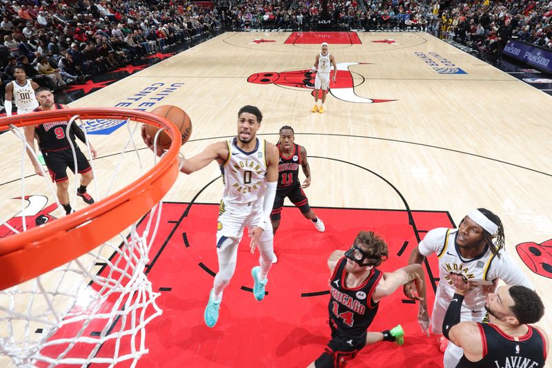 CHICAGO, IL - DECEMBER 6: Tyrese Haliburton #0 of the Indiana Pacers drives to the basket during the game against the Chicago Bulls on December 6, 2024 at United Center in Chicago, Illinois. NOTE TO USER: User expressly acknowledges and agrees that, by downloading and or using this photograph, User is consenting to the terms and conditions of the Getty Images License Agreement. Mandatory Copyright Notice: Copyright 2024 NBAE (Photo by Jeff Haynes/NBAE via Getty Images)