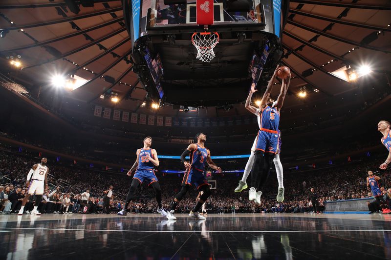 NEW YORK, NY - FEBRUARY 3: Precious Achiuwa #5 of the New York Knicks grabs the rebound during the game against the Los Angeles Lakers on February 3, 2024 at Madison Square Garden in New York City, New York.  NOTE TO USER: User expressly acknowledges and agrees that, by downloading and or using this photograph, User is consenting to the terms and conditions of the Getty Images License Agreement. Mandatory Copyright Notice: Copyright 2024 NBAE  (Photo by Nathaniel S. Butler/NBAE via Getty Images)