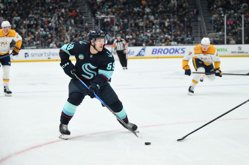 Jan 1, 2026; Seattle, Washington, USA; Seattle Kraken center Ben Meyers (59) plays the puck during the second period against the Nashville Predators at Climate Pledge Arena. Mandatory Credit: Steven Bisig-Imagn Images